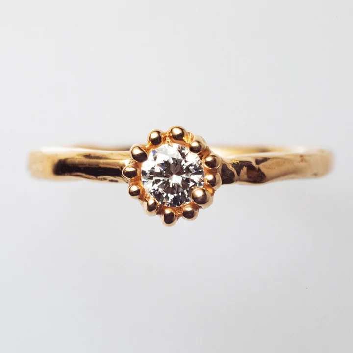 Rose Gold Ring with Diamonds Surrounded by Tiny Dots